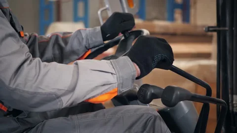 Man lifting forklift folks